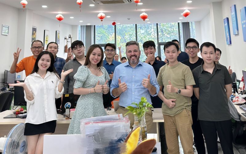 A professional team collaborating on high-end software solutions at EZTEK